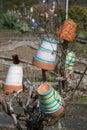 flower pots painted with colorful stripes Royalty Free Stock Photo