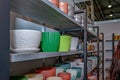 Flower pots on the shelf in a large store. Flower warehouse Royalty Free Stock Photo