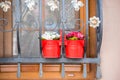 Flower pots stand on a window with iron bars Royalty Free Stock Photo