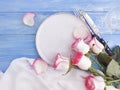 Flower rose plate vintage on wooden background