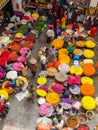 Flower sellers and their customers at colorful KR Market in Bangalore
