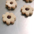 Flower shaped chocolate biscuits Royalty Free Stock Photo