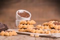 Flower shaped chocolate biscuits. Royalty Free Stock Photo