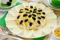 Flower shaped salad decorated with potato chips