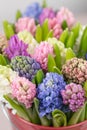 Flower shop concept. Mixed color. Fresh spring flowers in refrigerator room for flowers. Bouquets on shelf, florist Royalty Free Stock Photo