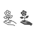 Flower in soil on human hand line and solid icon, gardening concept, Spring flower with leaves sign on white background Royalty Free Stock Photo