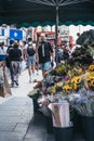 Flower stall on a street in Brixton, South London, UK, selective focus