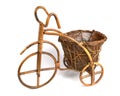 Flower stand in the form of a bicycle made from rattan. Left view