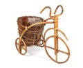 Flower stand in the form of a bicycle made from rattan. Right view