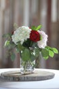 Flower table setting with barnwood background
