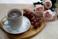 Flower tea cup somo grapes and peonies Royalty Free Stock Photo