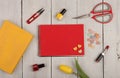 Flower tulip, blank red note pad, yellow book, scissors, nail po