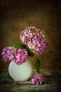 Flower vase on textured backdrop