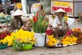 Flower vendors on a market in Hoi An, Vietnam