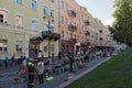 Flower vendors on Volodymyrska Street in front of the Golden Gate