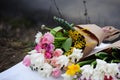 Flower wedding arrangement with ranunculus, pion, roses