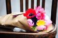 Flower wedding arrangement with ranunculus, pion, roses