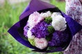 Flower wedding arrangement with ranunculus, pion, roses