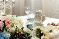 Flower wedding decoration with candles and angel Royalty Free Stock Photo