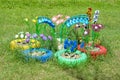 Flowerbed with flowers made from old plastic bottles Royalty Free Stock Photo