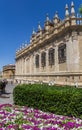 Flowerbed in front of the historic cathedral in Sevilla