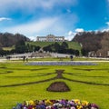 Flowerbed, Tourists, Neptune Fountain and Gloriette at Schonbrunn, Vienna, Austria