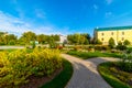 Flowerbeds, Grass Pathway and Ornamental Vase in a Formal Garden