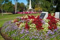 Flowerbeds and monuments on a town square