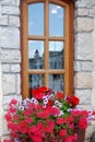 Flowerbox Accentuates a Lovely Window Royalty Free Stock Photo