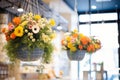 flowered hanging baskets in a retail setting Royalty Free Stock Photo