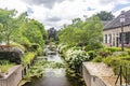 The flowered Herengracht in the picturesque village of Drimmelen, Netherlands Royalty Free Stock Photo