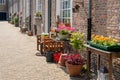 Flowering plants in the historic beguinage in Breda Royalty Free Stock Photo