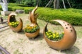 Flowerpot made from copper alloy display in the public park in Haeundae Dongbaekseom Island