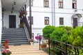 Flowerpots with flowers at staircase of front porch. Royalty Free Stock Photo