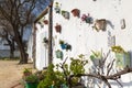 Flowerpots on the walls of Vejer De La Frontera, Spain