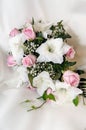 Beautiful bouquet of roses and white and pink lilies. Lilium.