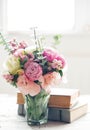 Flowers and ancient books Royalty Free Stock Photo