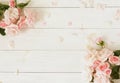 Flowers background. Bouquet of beautiful pink roses on white wooden background. Royalty Free Stock Photo