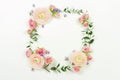 Flowers background. Wreath frame made of pale pink roses flowers and eucalyptus branches