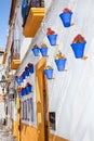 Flowers in blue flowerpot, Cordoba. Spain Royalty Free Stock Photo