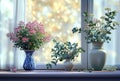 flowers are in blue and white vases in front of a window Royalty Free Stock Photo