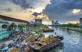 Flowers boat at flower market along canal wharf