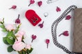 Flowers box with earrings ring bracelet handbag Royalty Free Stock Photo