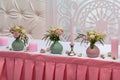 Flowers and candles on a celebratory table Royalty Free Stock Photo