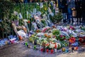 Flowers and candles in memory of the victims of the Charlie terrorist attacks in Paris in France