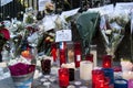 Flowers, candles and signs against terrorist attack in Paris, placed in front of French embassy in Madrid, Spain