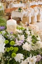 Flowers and celebratory table. Royalty Free Stock Photo