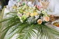 Flowers and celebratory table. Royalty Free Stock Photo