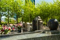 Flowers in a cemetery with tombstones in background Royalty Free Stock Photo