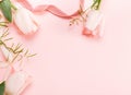 Flowers composition. Frame made of pink flowers on white background. Valentine's Day. Flat lay, top view. Royalty Free Stock Photo